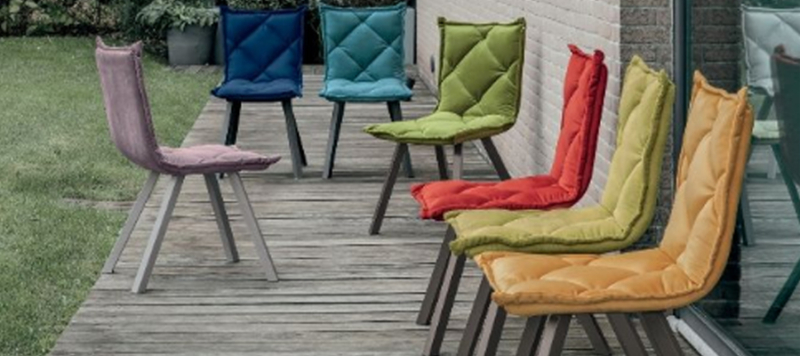 Yellow green blue red fabric chairs outdoor.