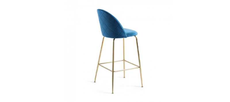 Back view of bar stool with golden legs.