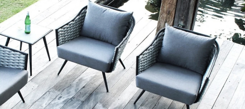 Outdoor armchairs in grey colours.
