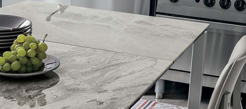 Close up of marble white top of dining table.
