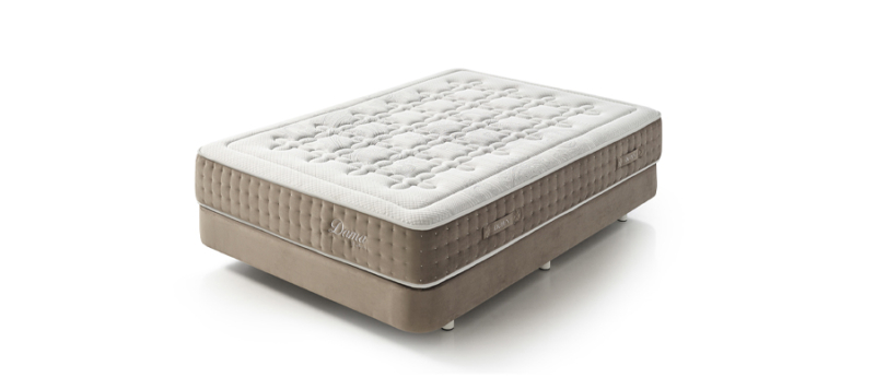 Dupen mattress on a bed.