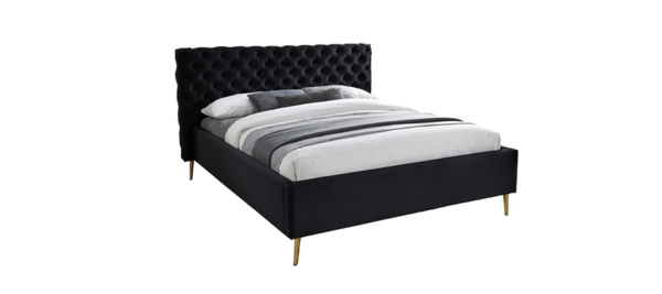 Eros bed in bedroom fabric velvet black and gold legs.