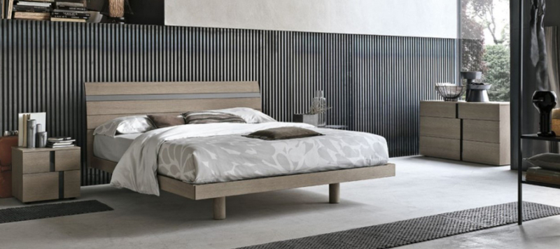 Joker wooden bed in a bedroom.