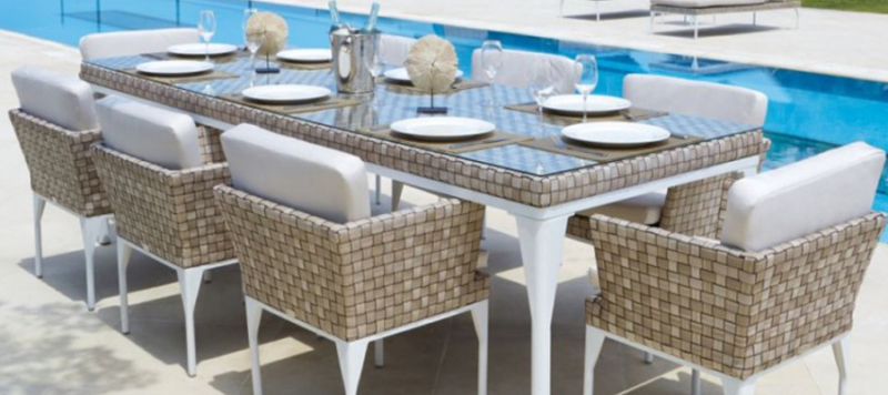 Rattan outdoor dining table white and brown.
