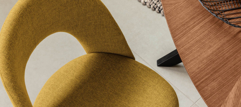Fabric mustard kitchen chair.