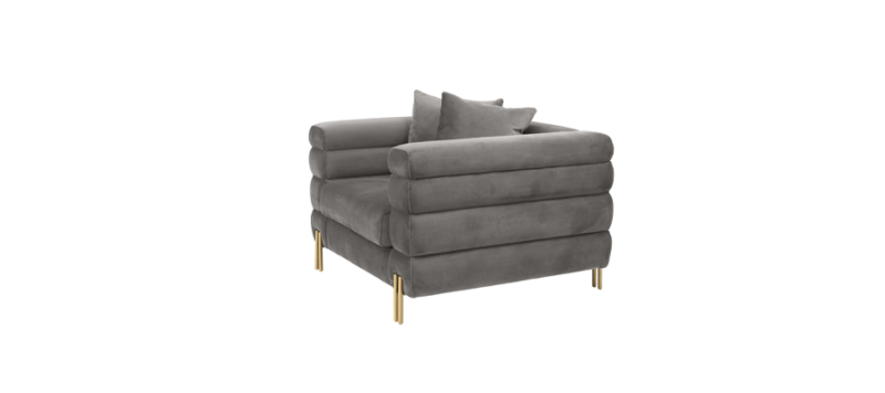 Side view of grey chair and gold legs.